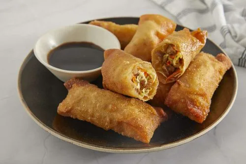 What is normally served with pho vietnamese?