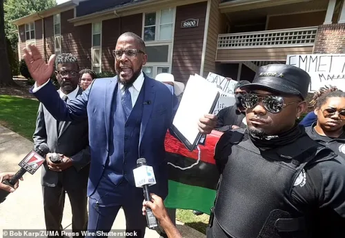 Protesters Emmett Till arrive as they storm the high-end facility looking for Carolyn Bryant Donham