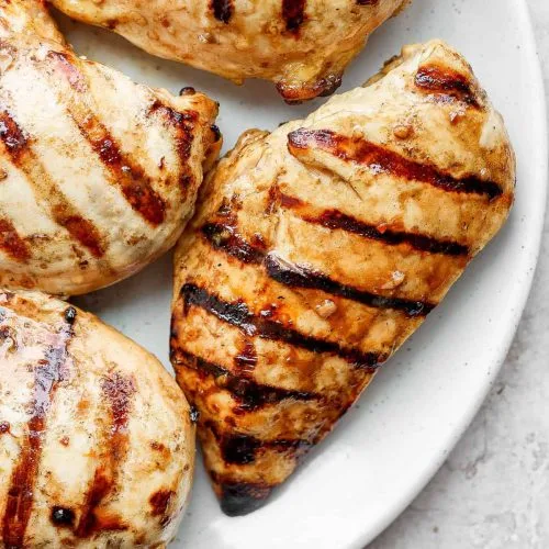 What is the secret to juicy grilled chicken breast?